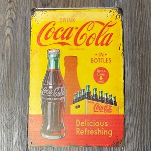 Coca-Cola Metal Sign with Red and Yellow Design